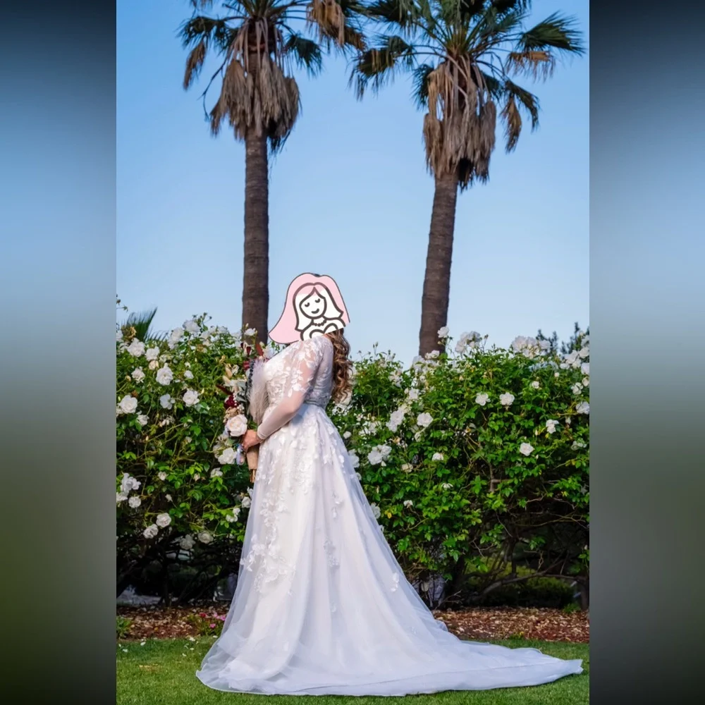Elegant Ivory Long Sleeve Illusion Wedding Dress with Timeless Charm - Picture 11 of 11